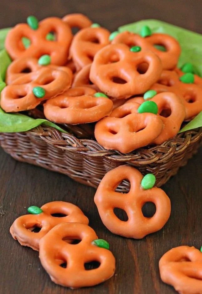 Assorted make-ahead Halloween treats arranged for a festive party display.