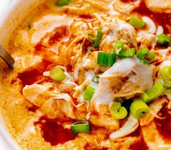 Delicious Buffalo Chicken Soup served in a bowl with toppings.