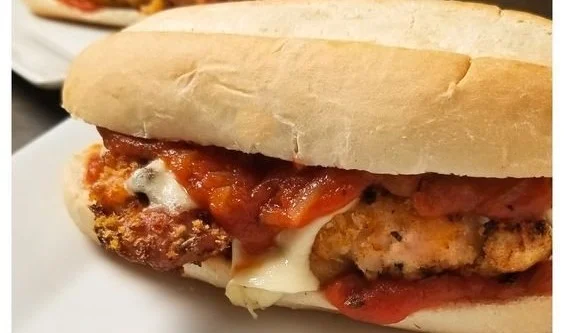 Delicious Chicken Parmesan Sandwich with crispy chicken and marinara sauce