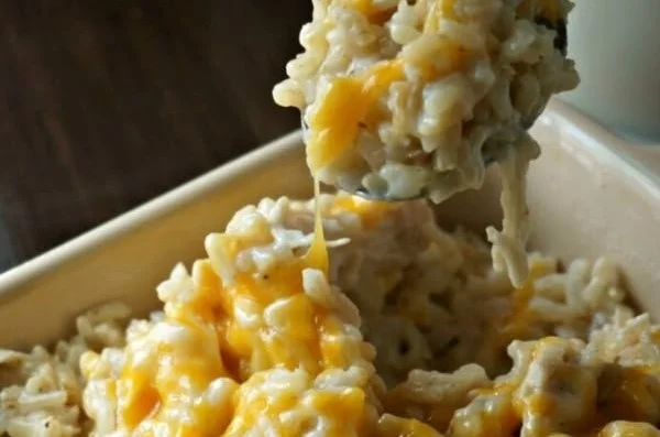 Bowl of creamy cheesy chicken and rice, the ultimate comfort food dish