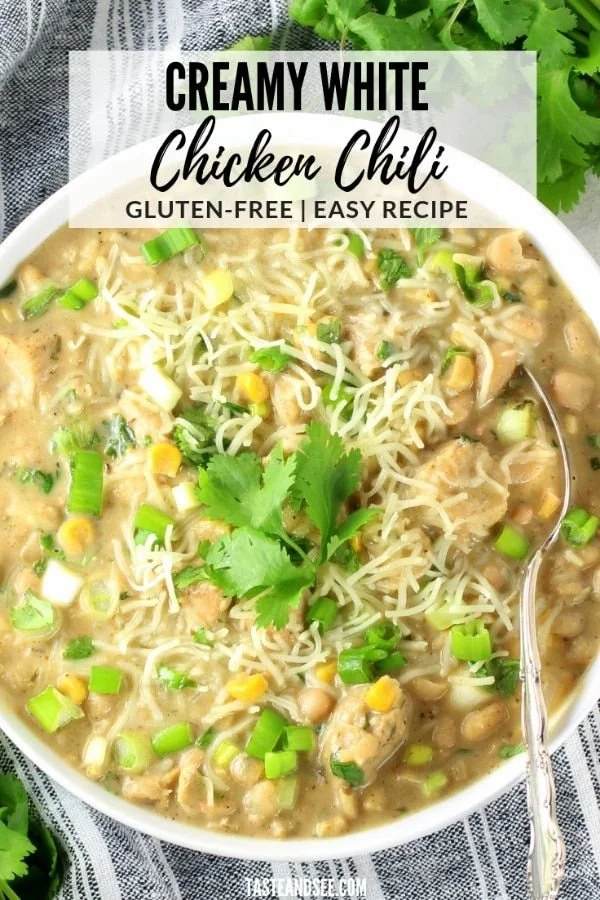 Bowl of creamy white chicken chili topped with cilantro and cheese
