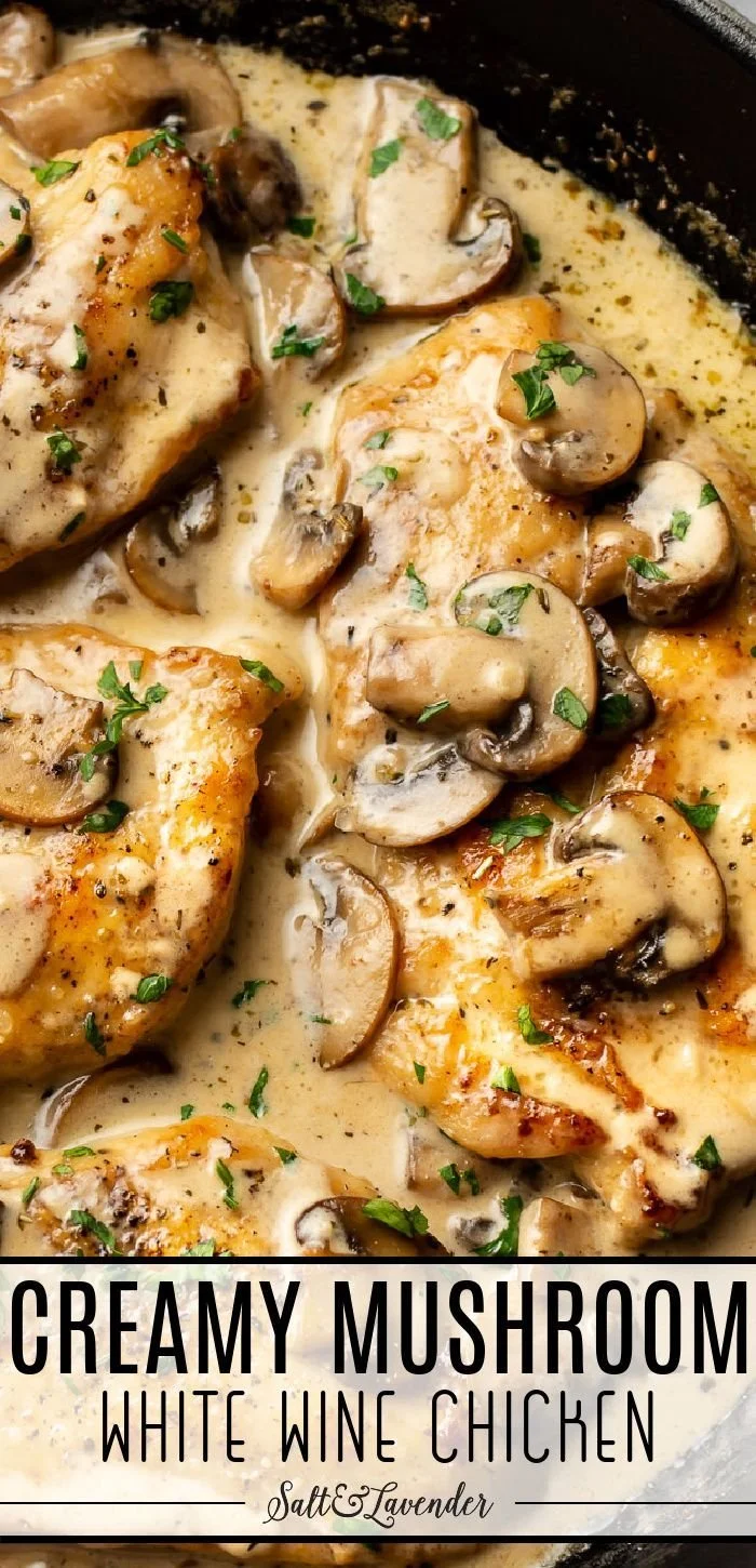 Creamy white wine chicken served on a plate with herbs and vegetables