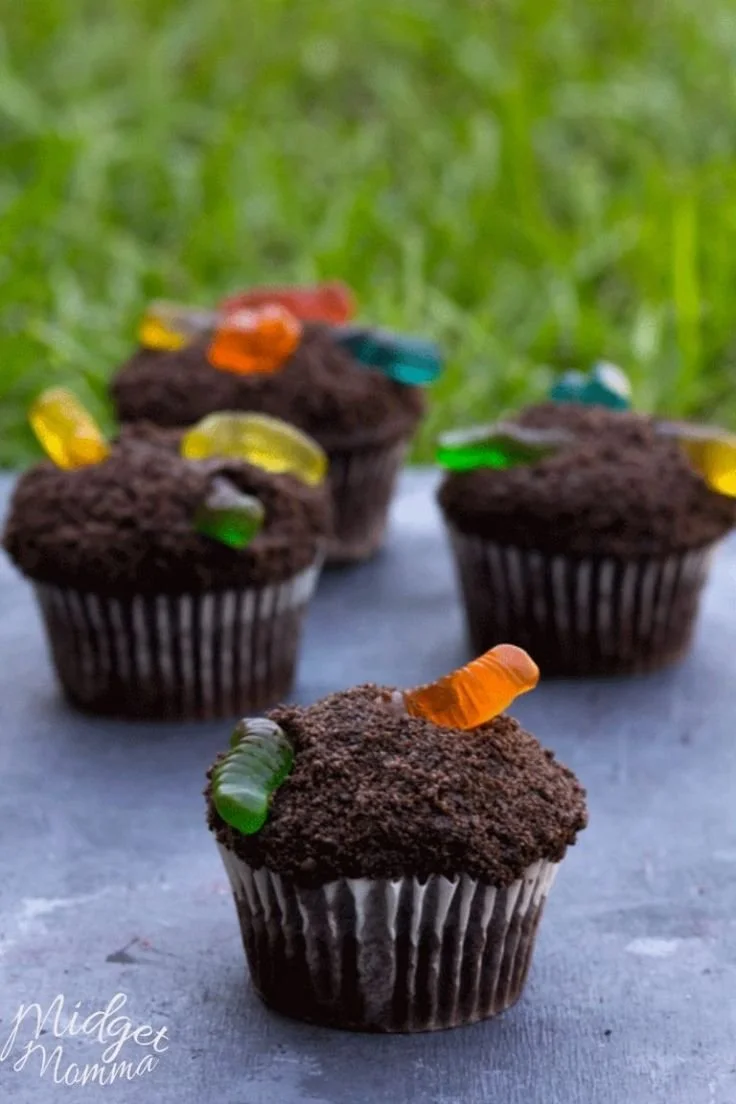 Delicious Cup Of Dirt Cupcakes topped with chocolate and gummy worms