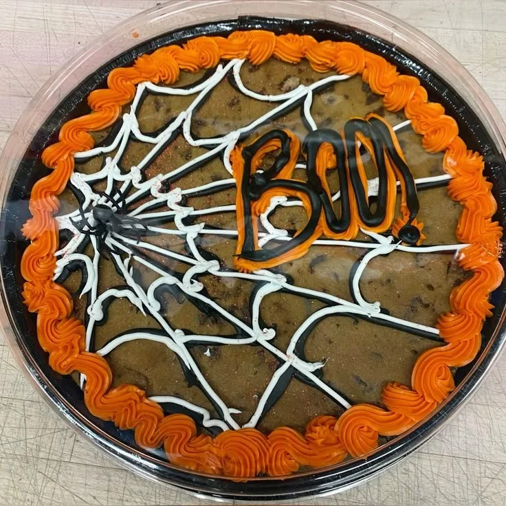 Delicious Halloween cookie cake decorated with spooky designs.