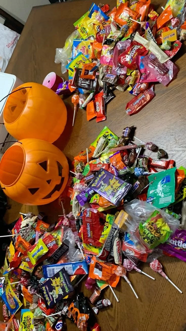 A table filled with creative Halloween party foods for a spooky celebration.