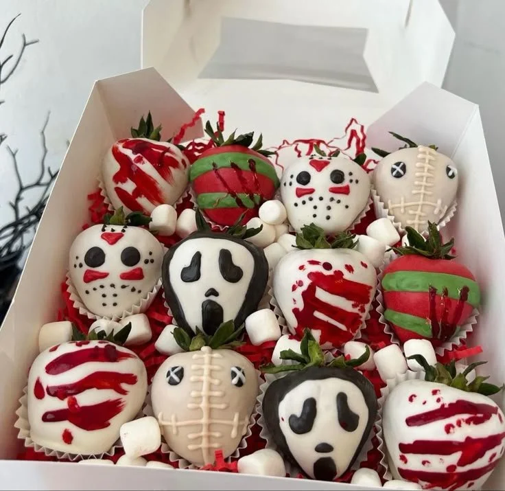 Festively decorated Halloween strawberries for spooky celebrations.