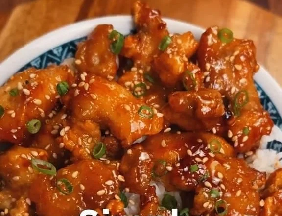 Delicious Honey Butter Chicken served on a plate with garnishes