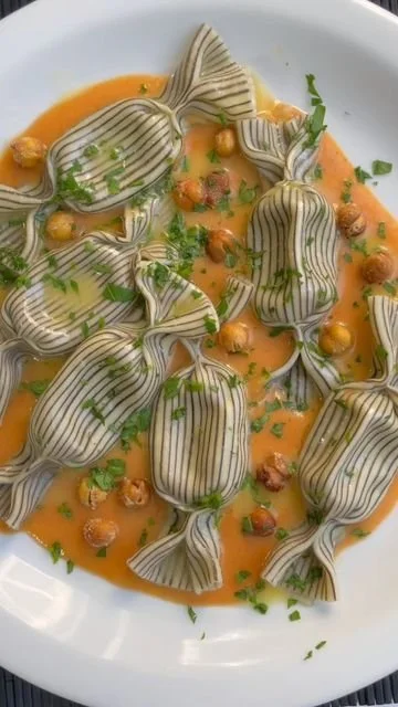 Ricotta Caramelle with tomato sauce and toasted chickpeas by David Rivillo