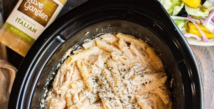 Slow Cooker Olive Garden Chicken Pasta dish served with herbs